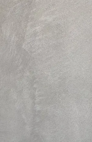 Mostra grisa amb traços diagonals.