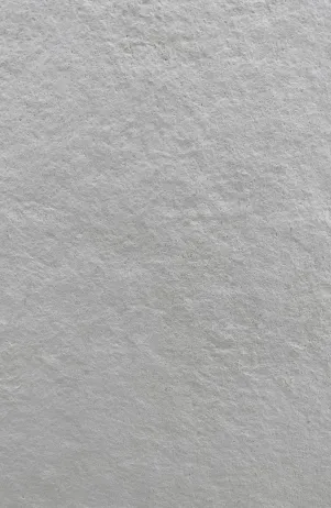 Mostra de textura grisa rugosa.