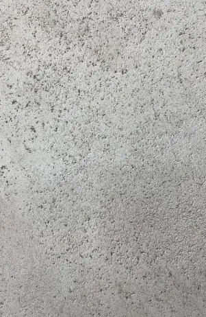 Mostra grisa amb textura clapejada.